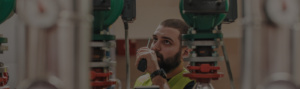 auditor-training-banner-image-man-inspecting-parts-with-hand-held-radio-receiver